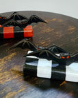 Bats Table Topper on Checked Base