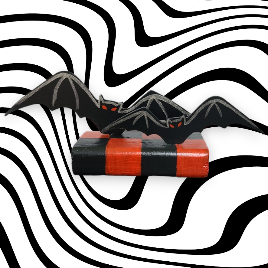 Bats Table Topper on Checked Base