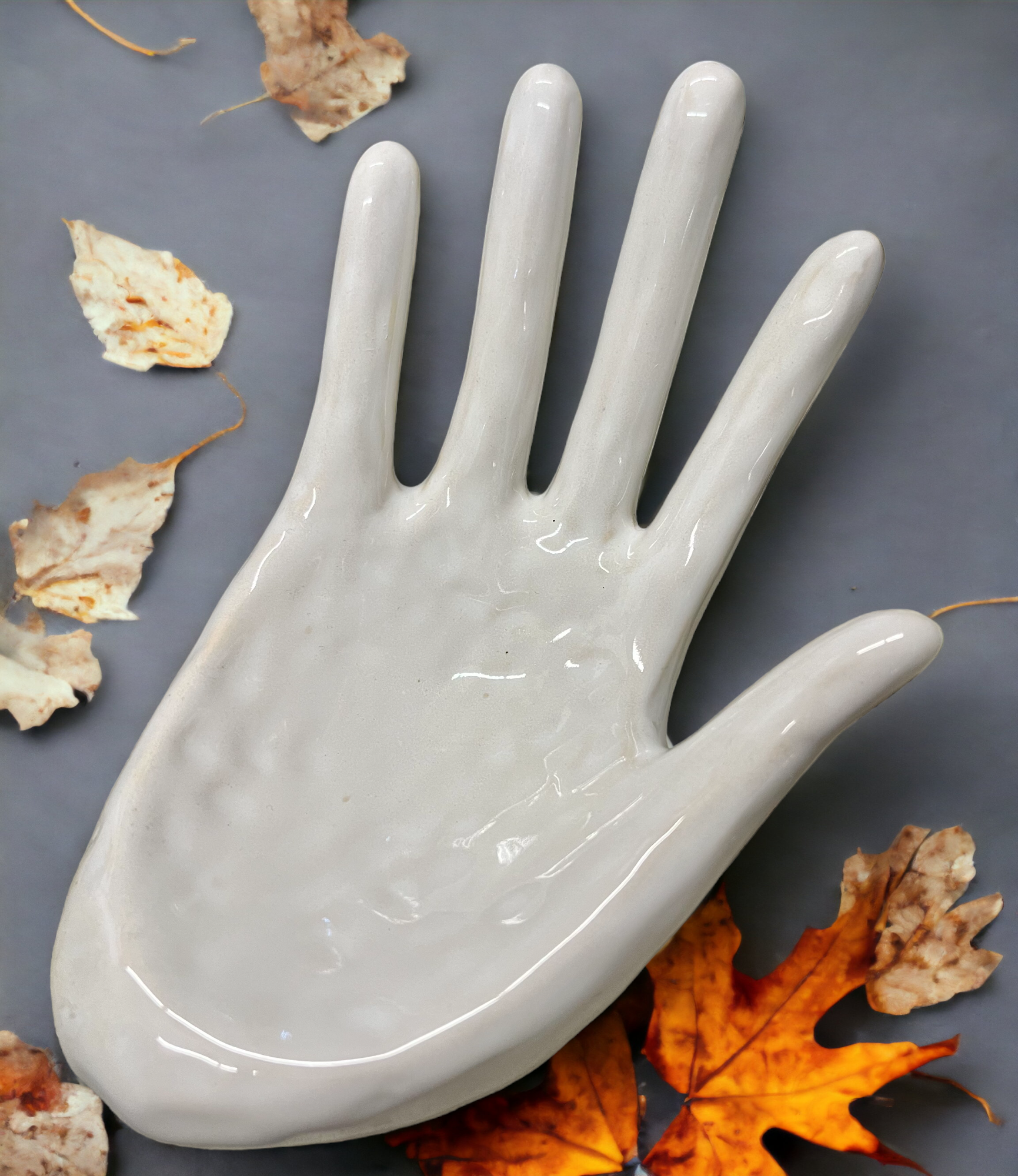 CERAMIC HAND HOLDER
