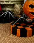 Bats Table Topper on Checked Base