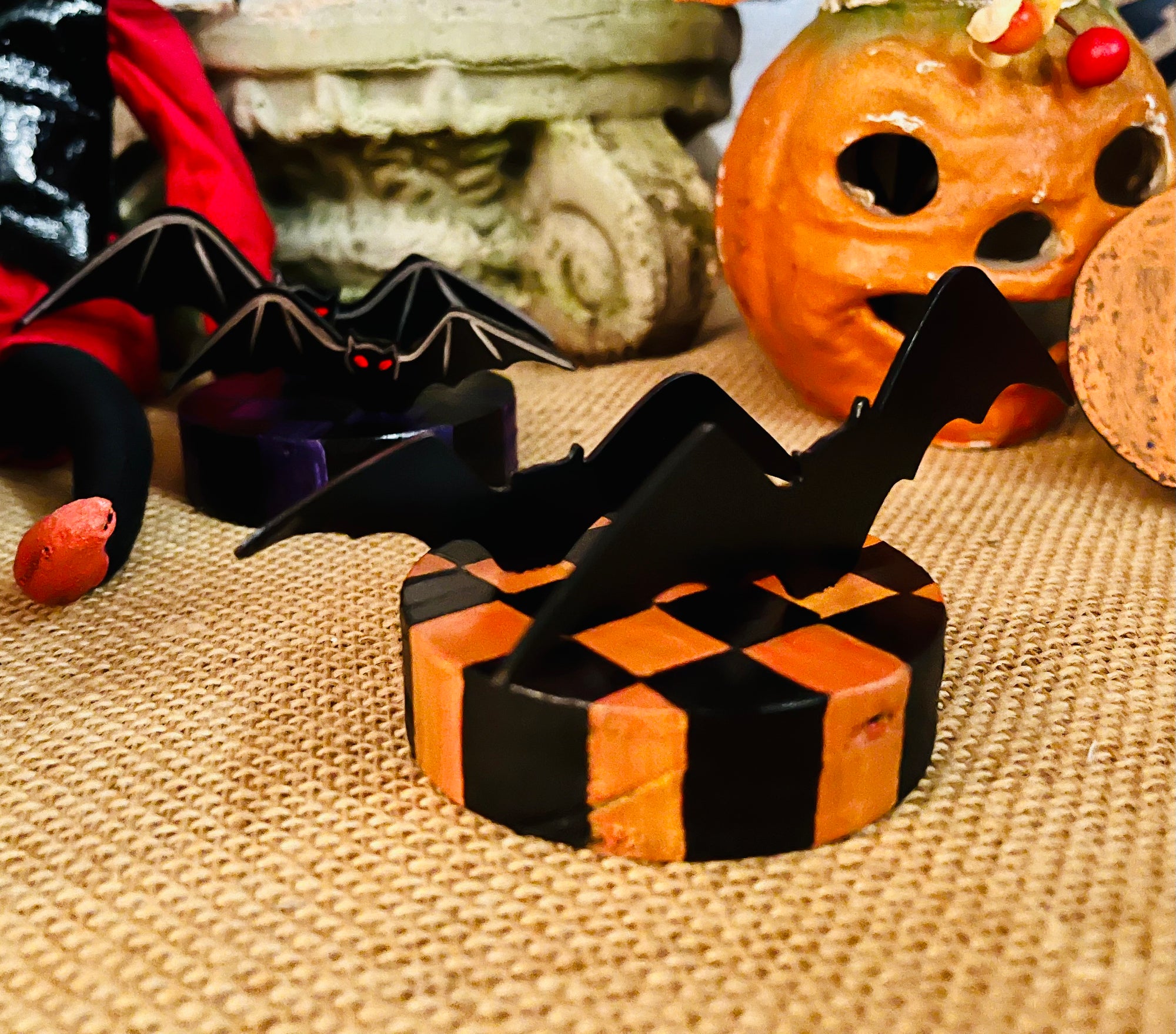 Bats Table Topper on Checked Base